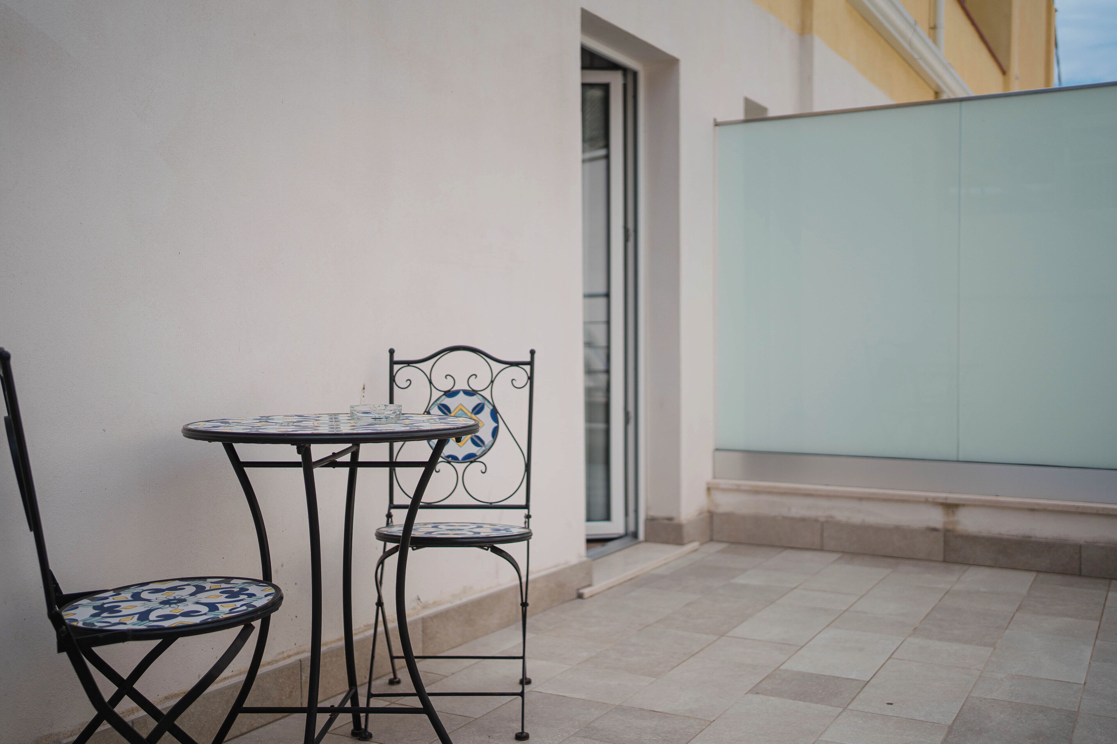 Deluxe-Vierbettzimmer | Terrasse/Patio