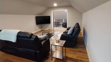 Smart TV, fireplace, DVD player, foosball