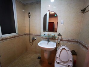 Family Double Room, Refrigerator | Bathroom | Shower, slippers, towels, soap - Nhu Y Hotel (Ho Chi Minh City)