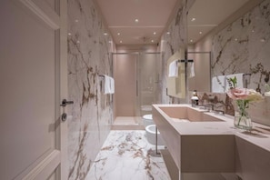 Hair dryer, bidet, towels, soap