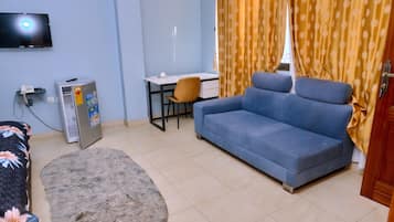 Suite Deluks, balkon, pemandangan kota | Area keluarga