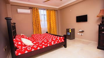 Deluxe Suite, Balcony, City View | Desk, laptop workspace, free WiFi