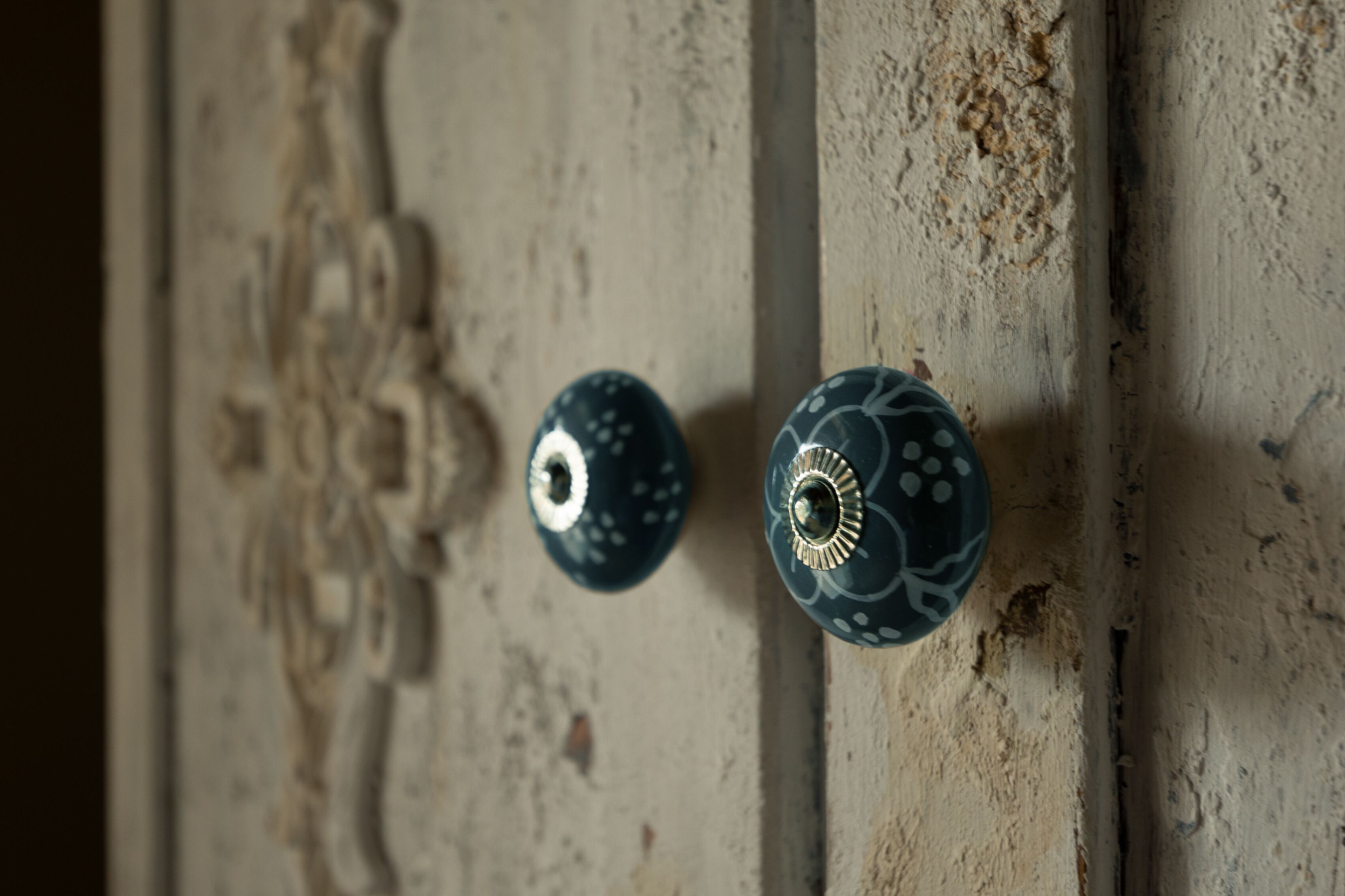 A door with two decorative knobs.