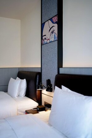 A hotel room with two beds, a nightstand with a lamp, and a decorative wall panel. - Moxy Ningbo Old Bund (Ningbo)
