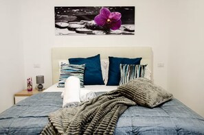 3 habitaciones, tabla de planchar con plancha, wifi y ropa de cama 