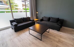 Superior Studio, Garden View | Living area | Computer, computer monitors - Cinema Zeus Studios - By Avelink (Spata-Artemida)