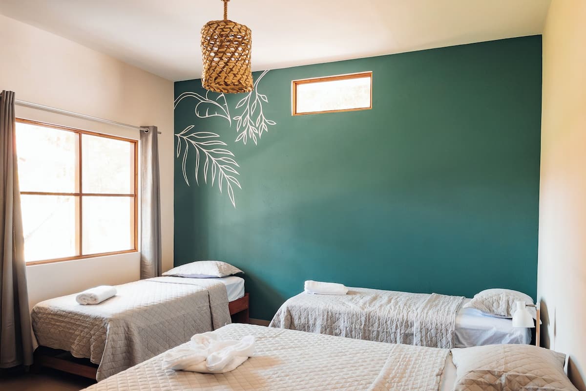 Quadruple Room, Garden View | Premium bedding, memory foam beds, laptop workspace
