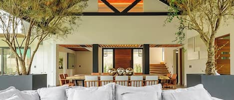 Premium House | Living area | 50-inch flat-screen TV with digital channels, fireplace