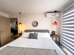 Luxury Apartment, 2 Bedrooms, Kitchen, Garden View | 2 bedrooms, in-room safe, blackout drapes, iron/ironing board