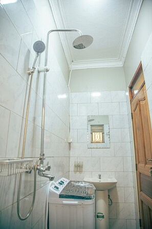 Shower, slippers, towels, soap