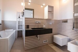 Hair dryer, bidet, towels, soap