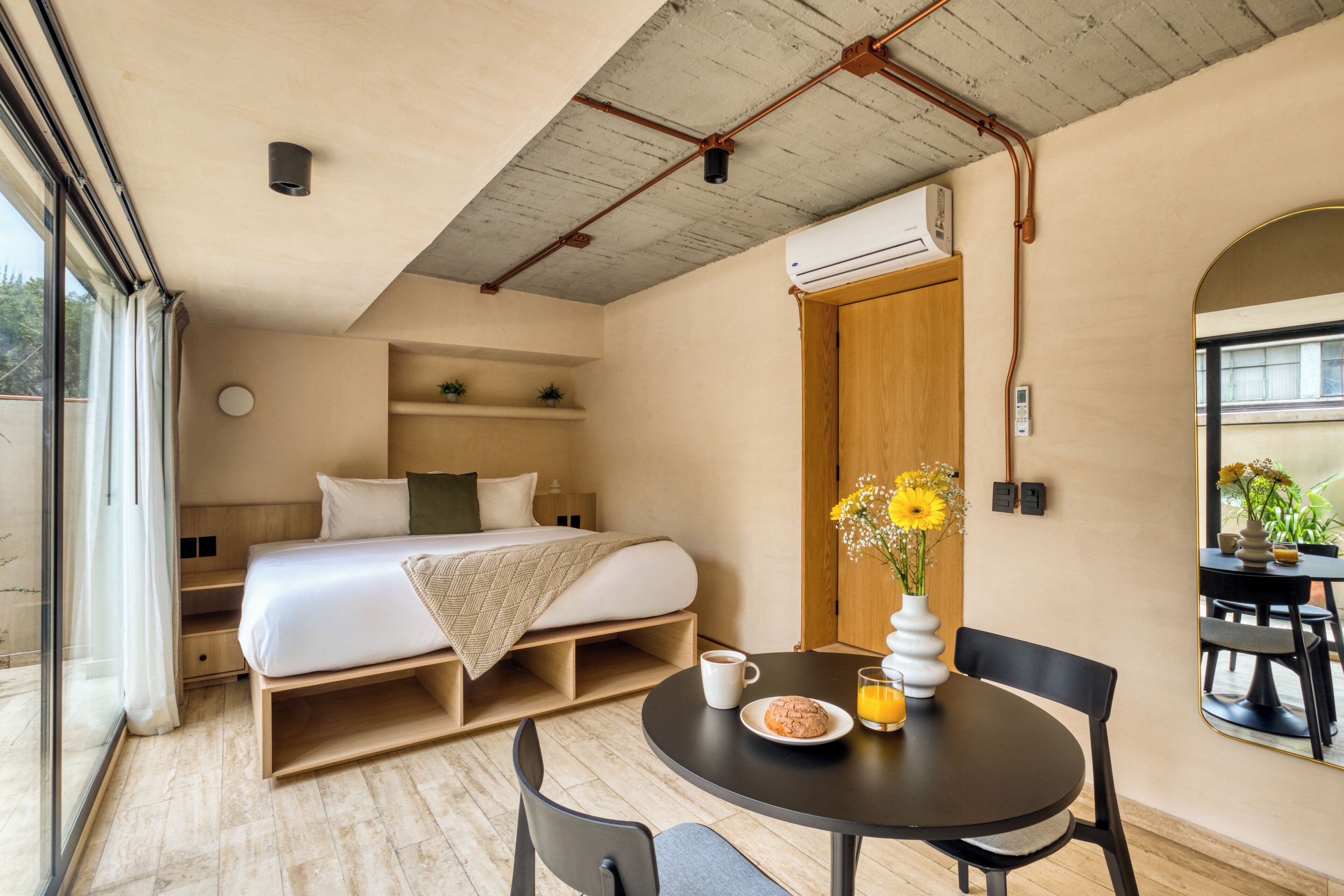 Deluxe Apartment, Patio | Minibar, in-room safe, desk, laptop workspace