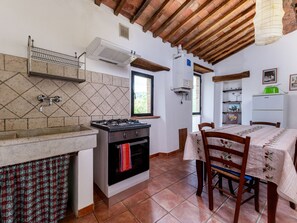 Fridge, oven, high chair, cookware/dishes/utensils