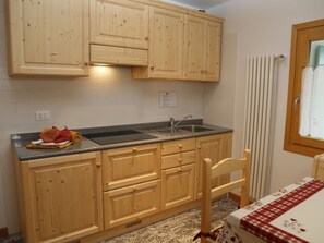 Fridge, microwave, cookware/dishes/utensils