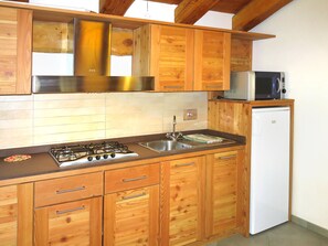 Fridge, microwave, cookware/dishes/utensils