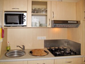 Fridge, microwave, cookware/dishes/utensils