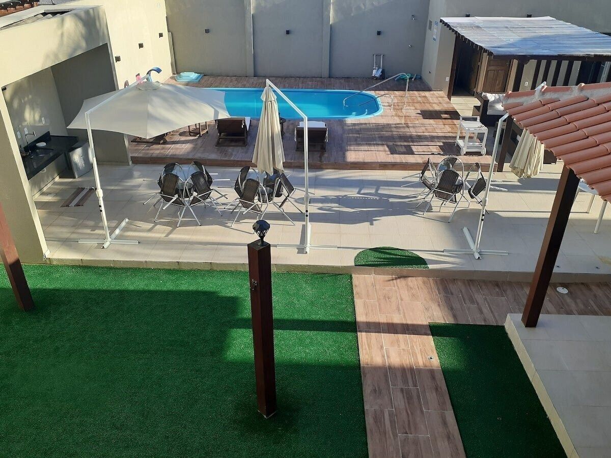 Quarto duplo premium, vista para o pátio | Piscina | 2 piscinas externas
