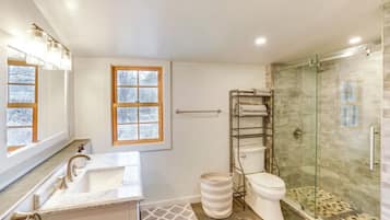 Shower, eco-friendly toiletries, hair dryer, towels