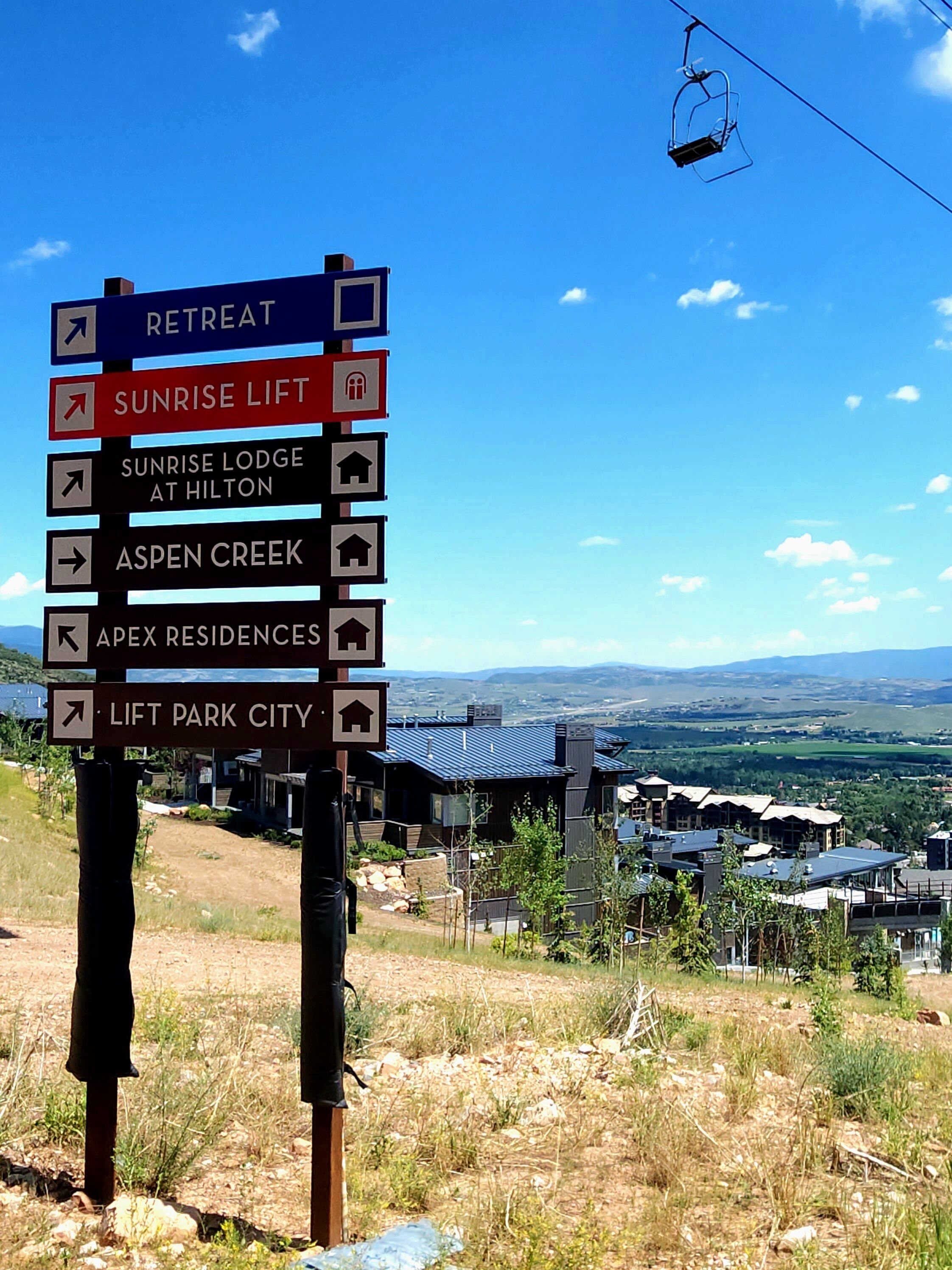 this sign directs you to back to Sunrise Lodge