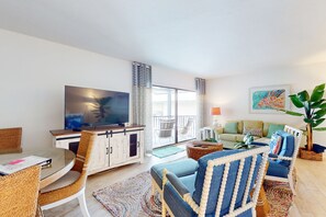 TV, books - Gulf-front condo with Gulf view, beach access, pool, tennis, & balcony (Holmes Beach)