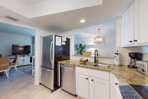 Fridge, microwave, oven, stovetop - Gulf-front condo with Gulf view, beach access, pool, tennis, & balcony (Holmes Beach)