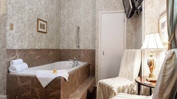 Shower, jetted tub, towels
