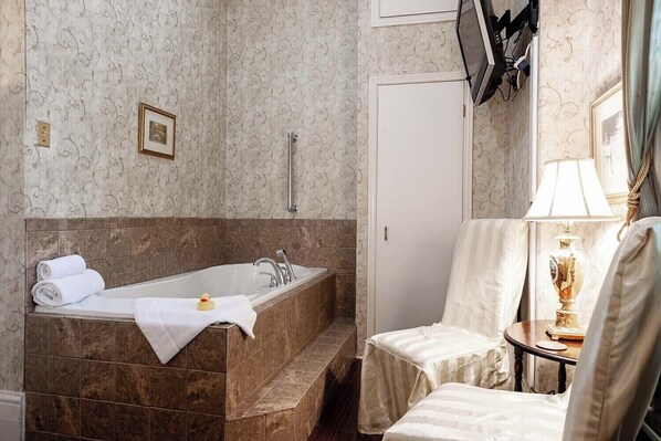 Shower, jetted bath, towels