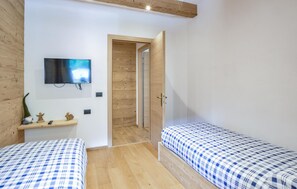 2 dormitorios, tabla de planchar con plancha, wifi gratis y ropa de cama