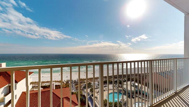 A balcony with a view of the beach and ocean. - Tides 1001 (Miramar Beach)