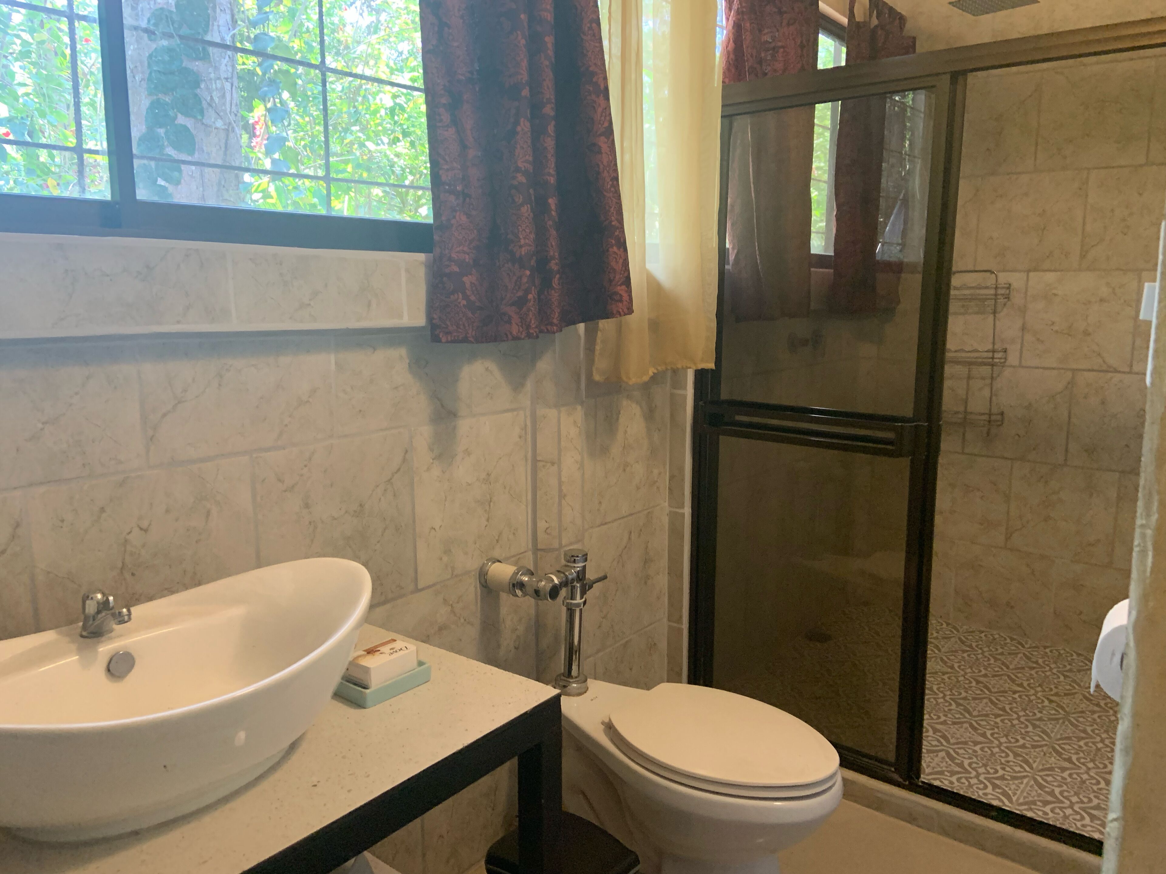 Shower, rainfall showerhead, hair dryer, towels