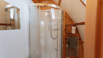 Shower, towels, soap, toilet paper