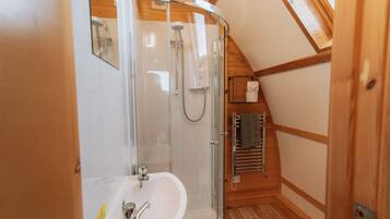 Shower, towels, soap, toilet paper