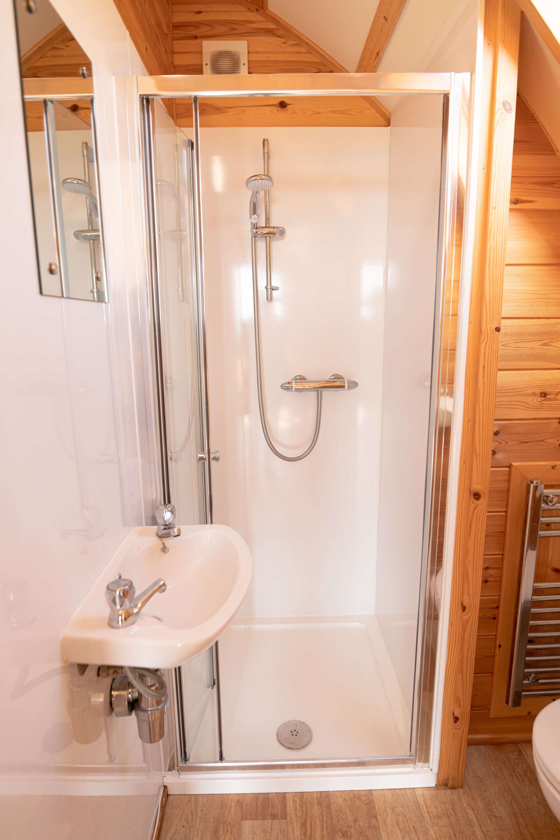 Shower, towels, soap, toilet paper