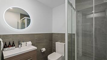 Eco-friendly toiletries, hair dryer, towels