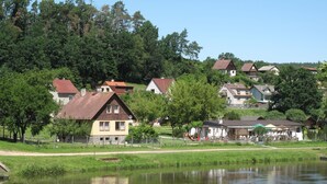 A lakeside village with houses, a playground, and a small dock. - Lužnice by Interhome (Tyn nad Vltavou)