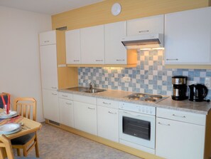 Fridge, oven, toaster, high chair