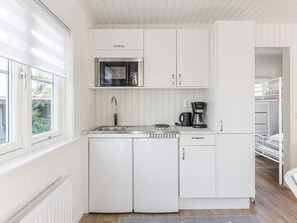 Fridge, microwave, cookware/dishes/utensils
