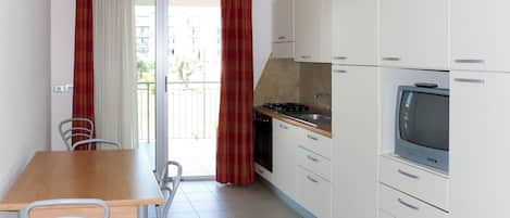 Fridge, oven, cookware/dishes/utensils