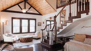 Smart TV, fireplace, books, printers