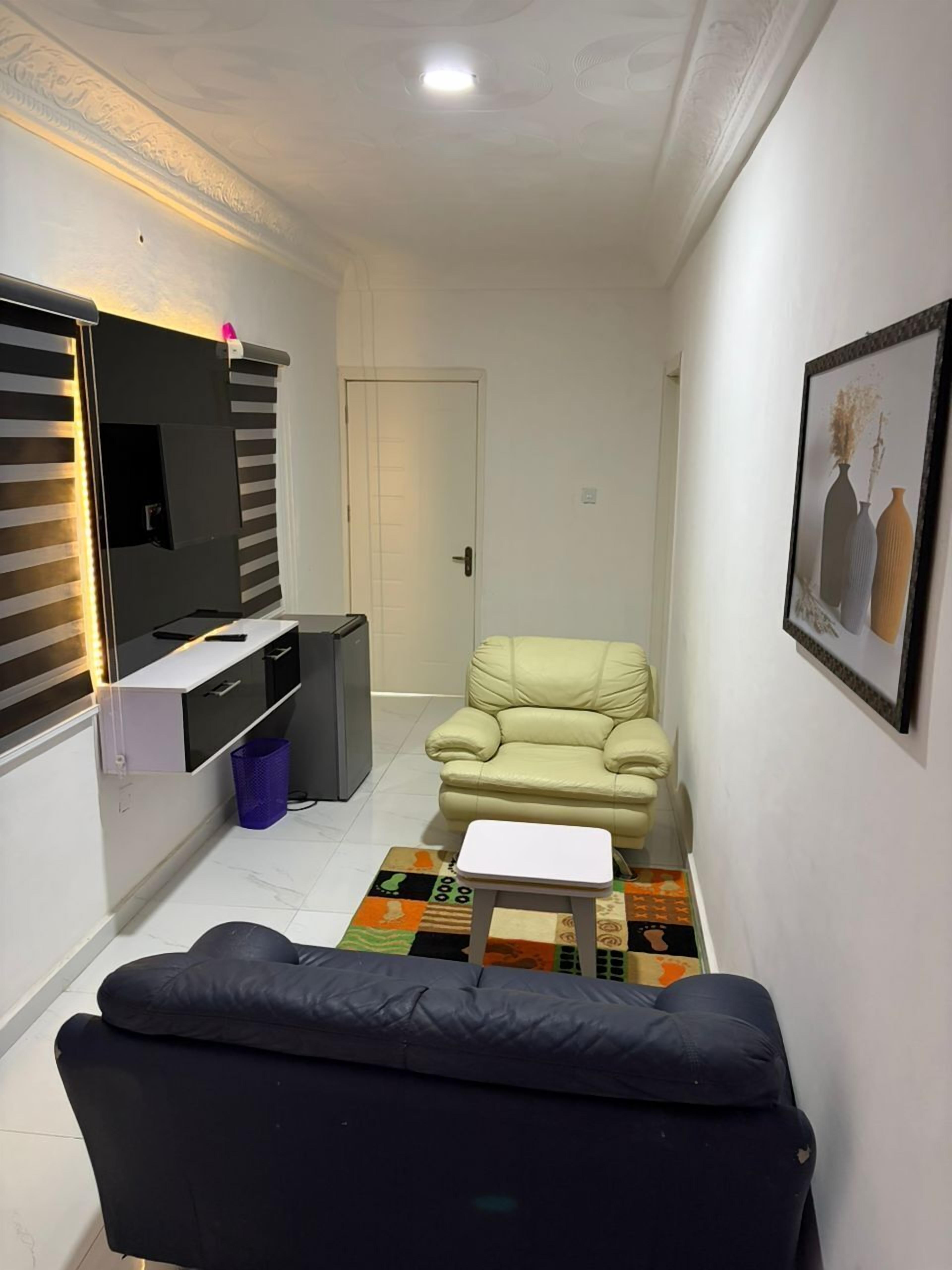 Executive Apartment, 2 Bedrooms | Living area | 42-inch Smart TV with cable channels