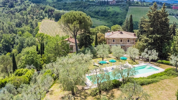 A villa with a swimming pool, surrounded by lush greenery and fields. - Policleto by Interhome (San Polo in Chianti)