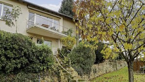 A two-story building with a balcony on the upper floor. - Am Weinberg by Interhome (Bad Dürkheim)