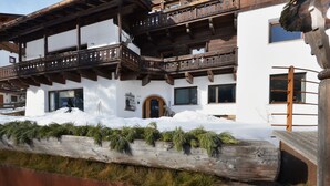 A traditional chalet with wooden balconies and a sign reading "TIROL". - Apartment Tirol by Interhome (Ortisei St Ulrich)