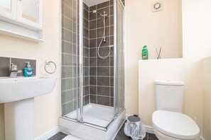 Shower, hair dryer, towels, soap