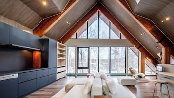 Comfort Chalet, Garden View | Living area | Flat-screen TV