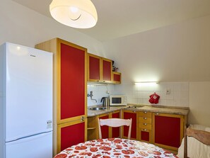 Fridge, microwave, toaster, cookware/dishes/utensils