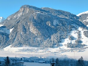 Surrounded by snow-covered mountains and dense forests, this village offers a serene winter wonderland experience.