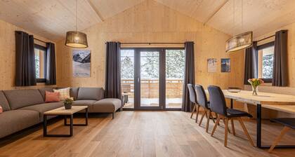 Superior Chalet mit Sprudelpool innen by Interhome