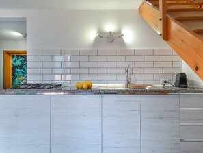 Fridge, cookware/dishes/utensils, dining tables - Il Melograno by Interhome (Capoliveri)