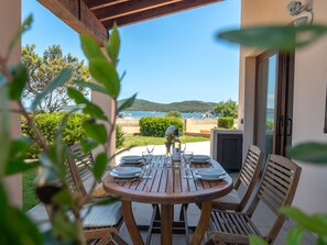 Outdoor dining - I Mirti di Porto Pozzo (PPZ123) by Interhome (Porto Pozzo)